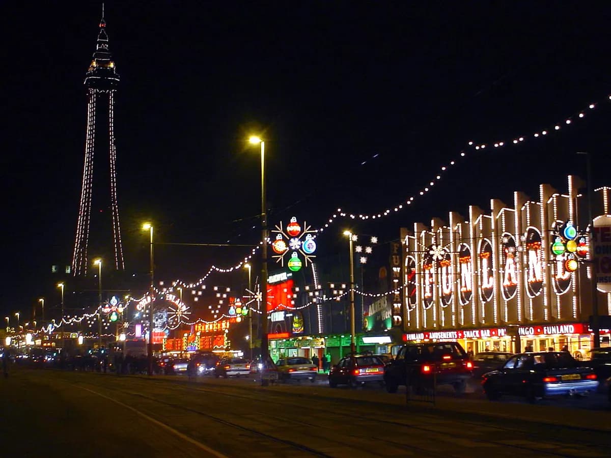 Blackpool: a tall iron lattice tower on a promenade with a pier running out over the sea