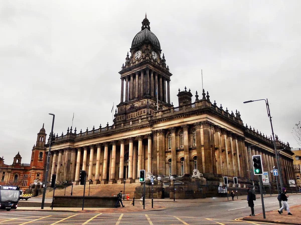 Leeds: a glass-roofed Victorian shopping arcade beside a domed town hall