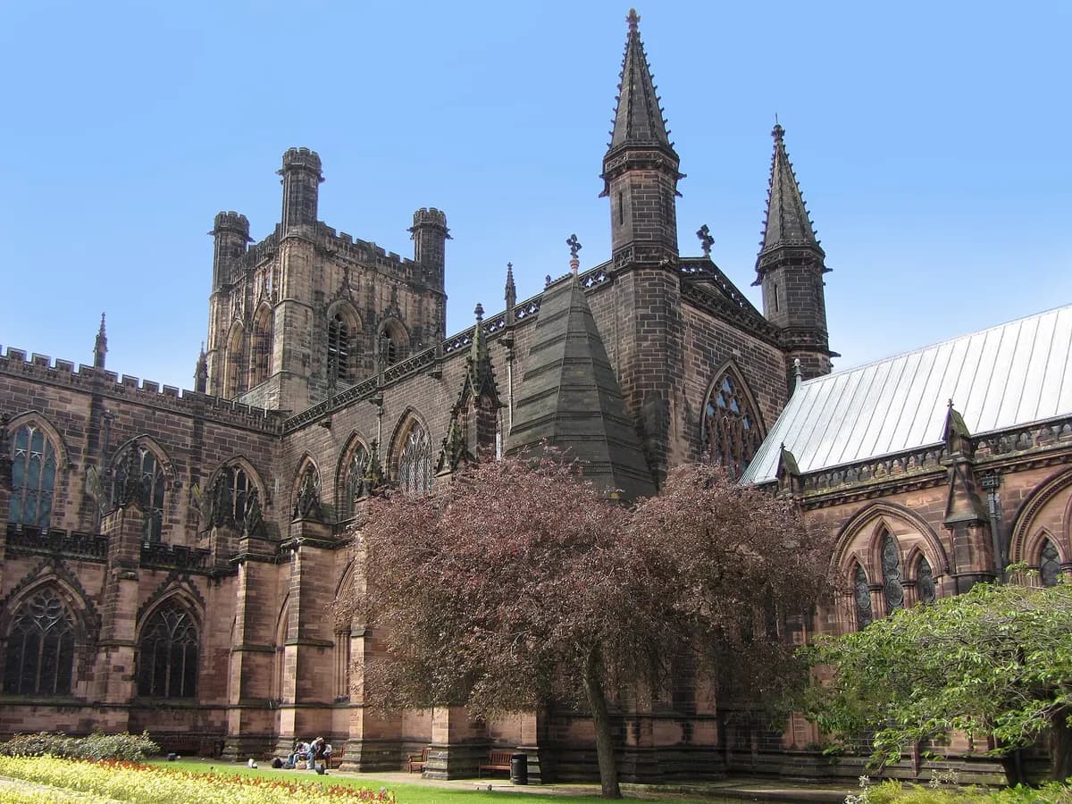 Chester: black-and-white timber-framed galleried shopping rows above a Roman city wall