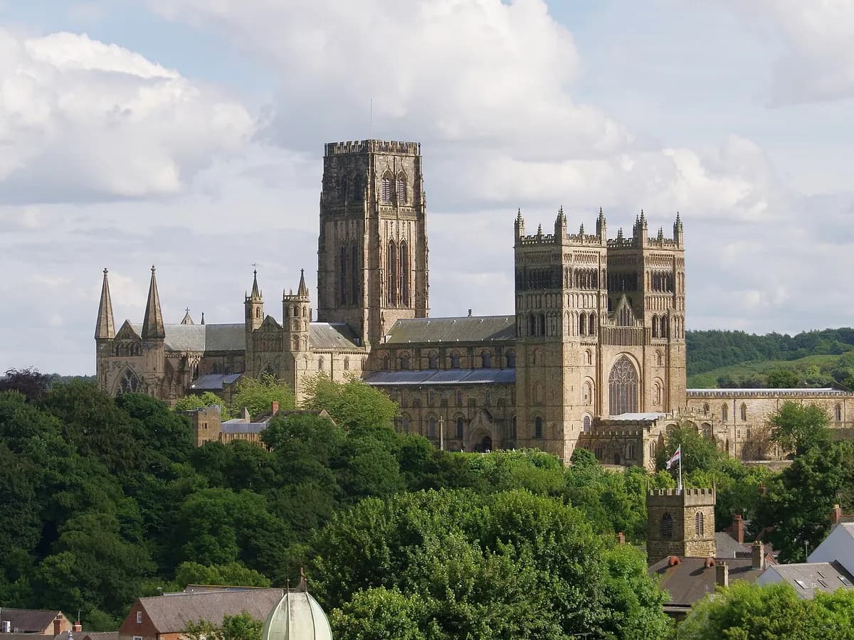 Durham: a Norman cathedral and castle together on a wooded peninsula above a looping river